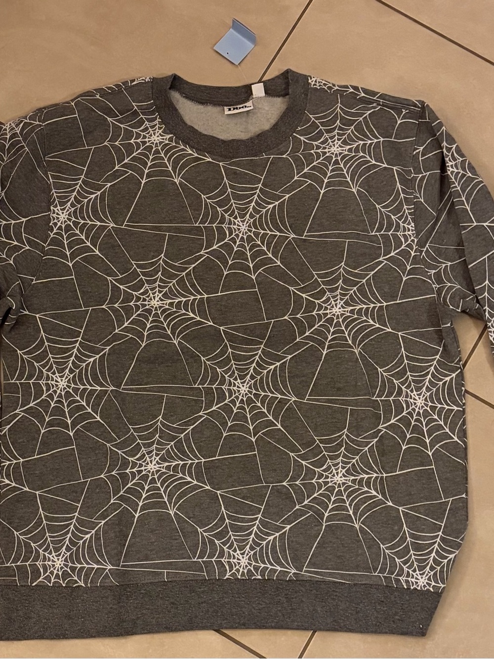 $39 for the set Gray Spiderweb Print Sweatshirt and pants
